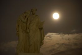 A perigee full moon or supermoon is seen over the The Peace Monument on the grounds of the United States Capitol, Sunday, August 10, 2014, in Washington. A supermoon occurs when the moon’s orbit is closest (perigee) to Earth at the same time it is full. Photo Credit: (NASA/Bill Ingalls)